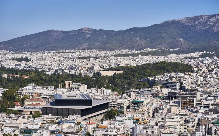 The Acropolis Museum among Athens buildings seen from Philopappos Hill