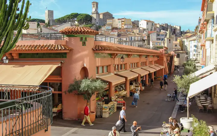 Exterior of Marché Forville with Le Suquet behind