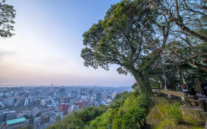 View from Shiroyama Observatory over Kagoshima city and Kinko Bay to the Sakurajima volcano
