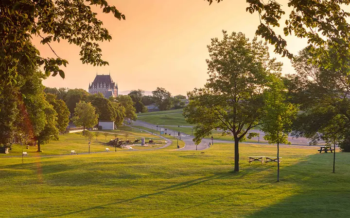 Wide lawns and trees on the Plains of Abraham in summer.