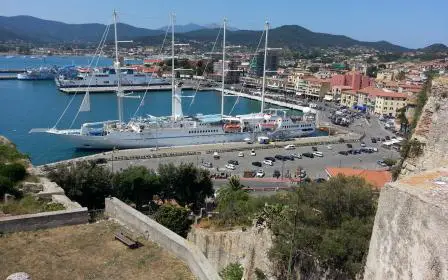 Cruise ship docked at the port of Portoferraio, Italy