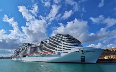 MSC Cruises Grandiosa cruise ship sailing to homeport