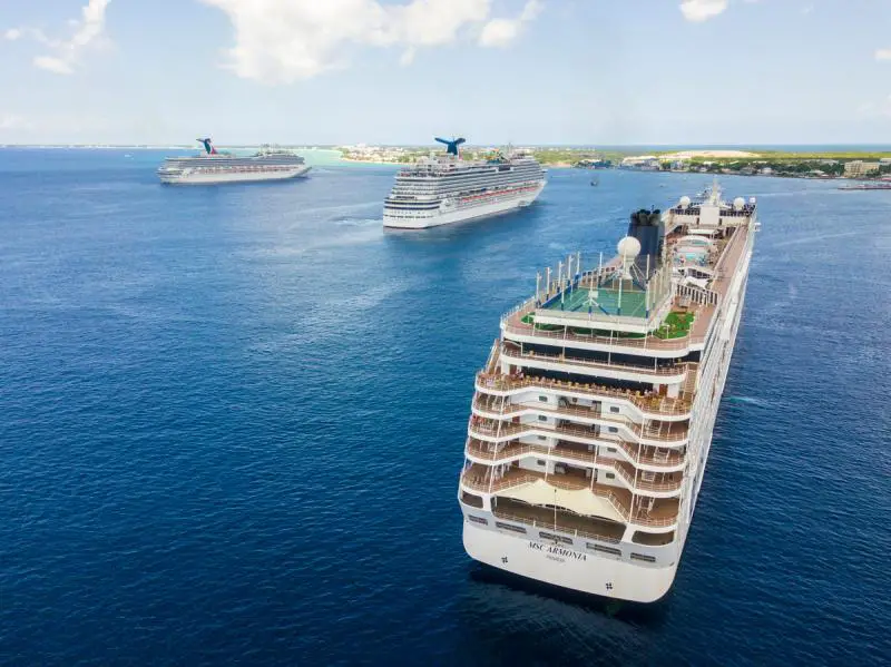 George Town Grand Cayman Cruise Port Guide CruiseDig   Carnival Cruise Ships Anchored At Georgetown Grand Cayman 