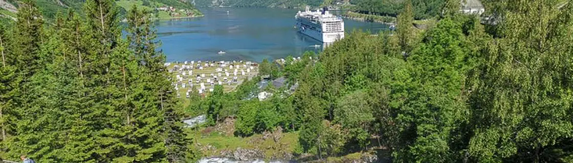 Cruise ship docked at the port of Geiranger, Norway