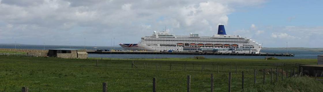cruise ship docked at the port of Kirkwall, Scotland