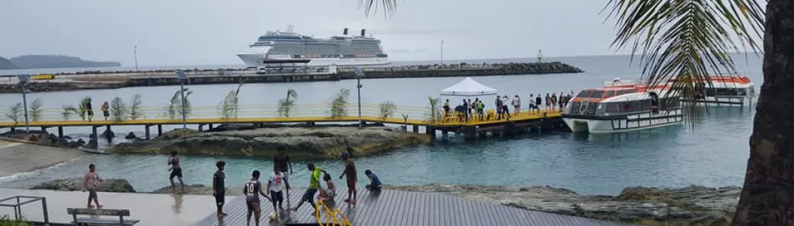 Cruise ship docked at the port of Mare, New Caledonia