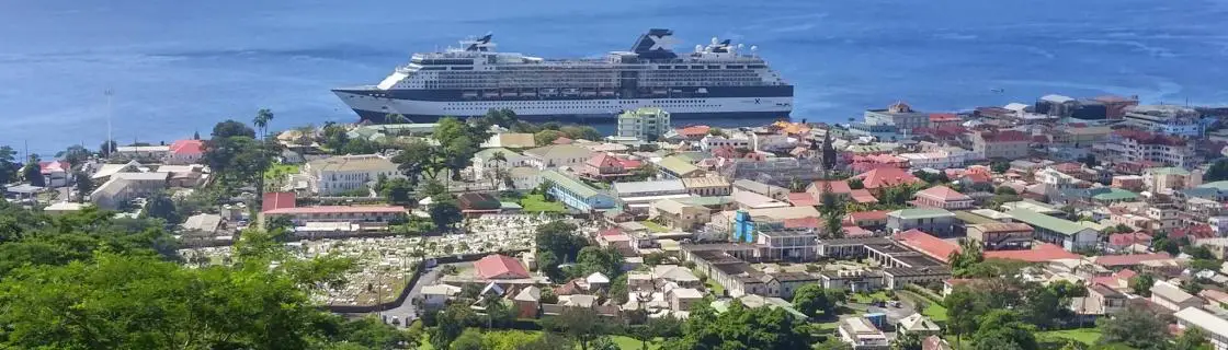 Celebrity cruise ship docked at the port of Roseau, Dominica