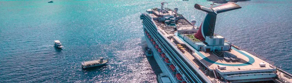 Carnival cruise ship anchored near Half Moon Cay, Bahamas