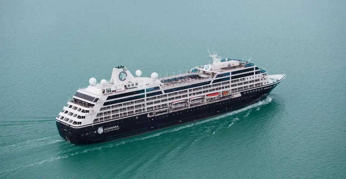 Azamara Quest cruise ship at anchor near port aerial view